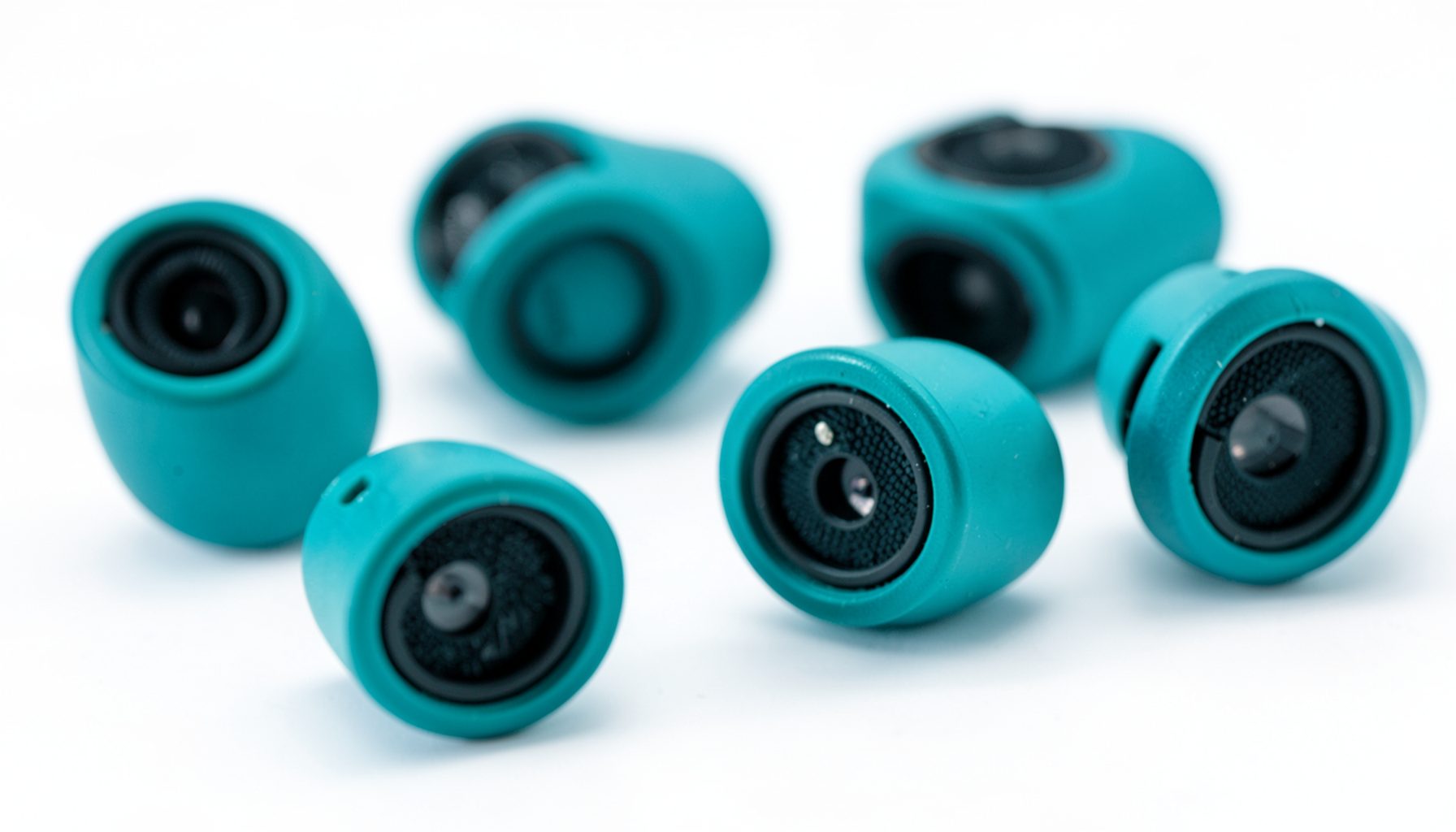 Array of camera-mounted microphones on a white background, product-style layout