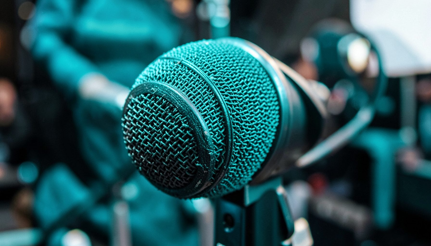 Boom microphone on a film set with directional pickup pattern illustration overlay